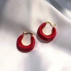 [MATERIAL]: Brass with enamel. [HOOP SIZE]: 20mm or 0.78" Trendy Red Metal Earrings, Red Enamel Hoop Earrings For Gifts, Red Enamel Hoop Earrings Gift, Trendy Red Metal Hoop Earrings, Small Hoop Red Earrings For Everyday, Trendy Small Hoop Red Earrings, Trendy Red Hoop Earrings, Trendy Small Red Hoop Earrings, Nickel Free Red Hoop Earrings