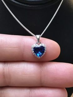 Note: Item Comes Without Chain. Specification:- Stone Details :- *Diamond Material: Cubic Zirconia (CZ)  *Center Diamond Shape : Heart Cut  *Total Diamond Weight : 1.33 CT (Approx.) *Center Diamond Measurement : 7.00 MM  *Center Diamond Weight : 1.13 CT *Side Diamond Measurement : 1.30, 1.40 MM *Side Diamond Weight : 0.20 CT *Diamond Color: White, Blue *Clarity: VVS *Making Process: Handmade by our Experienced Staff. *Stamp: Our All Pendant Stamped According to metal Purity (925 SIL/10/14/18K Gold).  Customization:- *Buyer can Request change of rhodium color in 925 Silver Jewelry (No additional Charge). *In Gold (10K, 14K, 18K) buyer can change gold color (White, Rose, Yellow). *Buyer can also change CZ Stone Color (No additional Charge). Custom Order:- *We do Accept Custom order. *Buyer c Blue Heart Cut Jewelry For Gift, Blue Heart Pendant Clavicle Chain Jewelry, Blue Gemstone Heart Necklace For Gift, Sapphire Heart Necklaces For Anniversary, Heart-shaped Sapphire Necklace For Anniversary, Sapphire Heart Necklace For Anniversary, Sapphire Necklace For Valentine's Day Gift, Blue Double Heart Jewelry For Valentine's Day, Blue Heart Pendant Jewelry Gift For Her