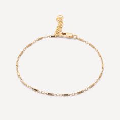 The perfect piece for a delicate layer to your stack, the Ruby bracelet is made to layer. A dainty bar chain catches light in the circular links, making it great for a simple, minimalistic aesthetic. 14k Gold Fill Length: 6" + 1" Extender Pieces from this collection are not eligible for any discounts or promotions Make your jewelry last! Click here for jewelry care. Need a gift box? We got you.K Dainty Yellow Gold Chain Bracelet For Layering, Dainty Gold Bracelet With Box Chain For Everyday, Delicate 14k Gold Bracelet With Delicate Chain, Minimalist Yellow Gold Chain Bracelet For Layering, 14k Gold Oval Link Bracelet With Delicate Chain, 14k Gold Chain Bracelet With Satellite Chain, Dainty 14k Gold Bracelet With Satellite Chain, Minimalist Yellow Gold Bracelets For Layering, Minimalist 14k Gold Satellite Chain Bracelet