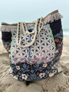 Large handmade carryall tote bag for all your summer picnics, outings and shopping! Outside is crafted with William Morris design fabric and the inside is a fun folk print. Adorned with vintage lace and tassel trim, with fringe trim handles. 18x19 in Summer Beach Bag Made Of Fabric, Fabric Beach Bag For Summer, Summer Beach Fabric Bag, Summer Beach Fabric Bags, Beach Fabric Tote Shoulder Bag, Bohemian Cotton Shoulder Bag For Travel, Summer Cotton Bag For Picnic, Cotton Summer Picnic Bag, Cotton Picnic Bag For Summer