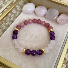 Hello! Welcome to Metrik Jewellery, thank you so much for being here and supporting my small business!  As a female entrepreneur, I am very happy and proud to present my designs to you! Your satisfaction is my number one priority in this store! Details:  - This ' Attract Love 'Bracelet is made of the following raw crystals: 8mm Amethyst, Rose Quartz and Pink Jade. -While designing this 'Attract Love' bracelet, I chose real raw stones that are most compatible with ' Attract Love '. -This bracelet is designed for you and your loved ones. I hope you love it and it brings you luck! -I hope all your dreams become your reality easily! -I will make your bracelet specifically for you with so much love and care. I would like you to know that the number of raw stones in your bracelet may increase or Manifest Love, Pink Jade, Attract Love, Quartz Pink, Love Spell, Love Bracelet, Amethyst Bracelet, Love Bracelets, Amethyst Stone