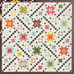 a quilt with many stars on it