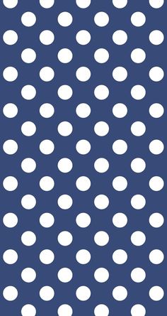 a blue background with white polka dots