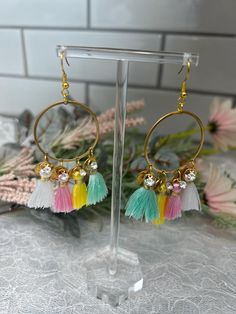 Fashion jewelry earrings with tassels. Earrings are light weight which is great because being dangle earrings they won't weigh down your ears and are comfortable on warmer days. Trendy Dangle Hoop Earrings For Spring, Trendy Spring Dangle Hoop Earrings, Spring Trendy Dangle Hoop Earrings, Gold Dangle Jewelry For Summer, Trendy Dangle Matching Earrings Jewelry, Multicolor Metal Dangle Hoop Earrings, Trendy Summer Jewelry With Tassels, Elegant Summer Dangle Hoop Earrings, Bohemian Multicolor Hoop Earrings