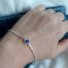 "Modern and simple Wave Hammered bangle for women. 2mm. Sterling silver wire stacking bangle is perfect in its simplicity. Gemstone bangle modern and trendy look. Summer jewelry, graduation gift. 6mm. Lapis Lazuli stone set in a decorated stone house. Layering bracelet, Everyday bracelet. Very important! to avoid mistakes, please make sure you have the right size. If you not sure then look at item photos and learn how to do it. Choose your length look at the picture to know how to take the right Silver Bangle Bracelets Unique Modern, Silver Birthstone Bangle Jewelry, Sterling Silver Round Bracelet With Birthstone, Round Bangle With Bezel Setting As Gift, Gemstone Bangle As A Gift, Nickel Free Minimalist Round Bangle, Gift Round Bangle With Bezel Setting, Round Bezel Set Bangle As Gift, Round Bezel Setting Bangle Gift