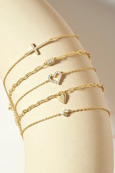 Material: 925 Sterling Silver Bracelet 6.5"+0.5“+0.5" three ring extension, total 7.5"-7.8"14K Gold plated+ecoatHorizontal Cross measures .5” Cross contains: CZ 0.9mm*20pcsCable chain measures 1.2mm width ***THIS IS A PREORDER - ORDERS WILL SHIP IN 3-4 WEEKS Gold Bracelets With Diamond Accents In Sterling Silver, Adjustable Gold Sterling Silver Diamond Bracelet, Gold Sterling Silver Bracelets With Diamond Accents, Gold Dainty Diamond Bracelet In Sterling Silver, Dainty Gold Diamond Bracelet In Sterling Silver, Dainty Gold Sterling Silver Diamond Bracelet, Gold Sterling Silver Diamond Bracelet With Adjustable Chain, Gold Diamond Accent Bracelet In Sterling Silver, Gold Sterling Silver Diamond Bracelet With Accents