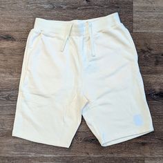 Nwt Undftd Off White Sweat Shorts Size S Waist 31" Inseam 9.5" Hip To Bottom 20.5" Rise 12" All Sales Final Tags: Undftd Undefeated Streetwear Hype Bait Sweats Off White Beige Cream White Cotton Athletic Shorts With Elastic Waistband, Relaxed Fit White Bottoms With Built-in Shorts, Basic White Bottoms With Built-in Shorts, White Cotton Athletic Shorts With Built-in Shorts, White Shorts With Ribbed Waistband For Spring, White Leisure Shorts, Sporty White Short Bottoms, Sporty White Short Length Bottoms, Sporty White Short-length Bottoms