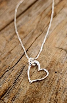 A beautiful heart charm necklace carefully placed on a sterling silver box chain. This is placed on your choice of 16, 18, or 20 inch sterling silver .89mm box chain. Open Heart Necklace For Mom For Valentine's Day, Heart Pendant Necklace For Mom, Valentine's Day Gift, Heart Pendant Necklace For Mom For Valentine's Day, Open Heart Necklace For Valentine's Day Gift For Mom, Open Heart Necklace For Mom On Valentine's Day, Valentine's Day Heart Pendant Necklace As Gift For Mom, Valentine's Day Open Heart Necklace Gift For Mom, Heart Beads Jewelry For Mom, Heart Pendant Jewelry For Anniversary