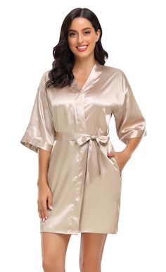 PRICES MAY VARY. Light and sleek fabric to accentuate curves; Smooth to the touch and easy on the skin. Featuring kimono oblique V neck,half sleeves,side pockets. Inside ties to keep the robe closed and exterior matching belt to keep firmly. Solid color tone kimono robes. Simple yet fashionable and elegant soft robes for women. Available in multiple colors,perfect for weddings,spa party,gifts,or everyday wear. Solid Bridesmaid Robes,Women's Silky Kimono Bathrobes for Bride,Wedding Party Loungewe Gifts 2021, Bridesmaid Kimono, Bridesmaid Robes Floral, Bridal Kimono, Robes For Women, Silky Robe, Soft Robes, Bridal Party Robes, Kimono Robes