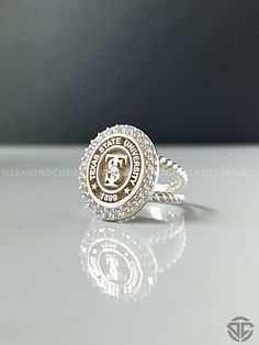 CREATE THE RING OF YOUR DREAMS YOURSELF: https://www.etsy.com/listing/1689395641 ❓ Material options: 925 sterling silver 10K - 14K - 18K - 22K Pure Gold --------------- Logo Size: 12mm*14mm --------------- ❓❓ How can I place my order: 1- Select the product you want 2- Create your order and fill in the personalization field 3- If you have a picture of your logo, send it to me via message. If you want your stones to change color, let me know. After placing your order, I will custom design your des White Rings With Center Stone For Collectors, White Collectible Rings With Center Stone, High School Rings, Class Rings College, College Ring, University Rings, School Crest, School Rings, Ring Stones