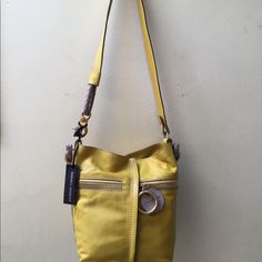 Mustard Color Bag, Gold Detailing In Zipper, Brand New With Tags. Original Value $400. Can Be Used Two Ways. Getting Rid Of My Belongings To Fund My Daughter Through Nursing School. Comes With Dust Bag! Luxury Yellow Satchel Shoulder Bag, Luxury Yellow Shoulder Bag For Shopping, Designer Yellow Leather Bags, Designer Yellow Rectangular Shoulder Bag, Luxury Yellow Crossbody Bag, Designer Yellow Bags For Everyday Use, Designer Yellow Pouch Bag, Luxury Yellow Bucket Bag With Removable Pouch, Designer Shoulder Bag With Leather Handles In Yellow