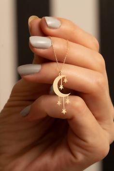 "14K Solid Gold Moon and Star Pendant Necklace /Crescent Moon Charm Necklace / Jewelry for Women / Mystic Gift For Her / Minimalist Necklace * Gold KT: 14K Solid Gold * Gold Color: 14k Yellow Gold * Chain Lengths: 14\", 15\", 16'' 18\", 20\", 22\", 24\" * The length of the chain in the photo is 18 inches * Pendant length: 2.60 cm * Pendant width: 1.10 cm Follow on Instagram - @bayargold.tr My Web Site - https://www.bayargold.com/ * Bayar Gold is a fine jewelry company. Please do not hesitate to ask us questions. We are always here to help you. * All items are packed in the high-quality jewelry box. The gift message is available. Please let us know what to write by leaving us a note at checkout. * Gift wrapping available. Express shipping * United States: 4-6 business days * Canada: 4-6 bus Dainty Charm Necklace, Cute Necklaces Aesthetic, Moon Gift Ideas, A Jewelry, Moon And Star Pendant, Simple Necklaces, Crescent Moon Necklace Gold, Pendant Ideas, Inexpensive Jewelry