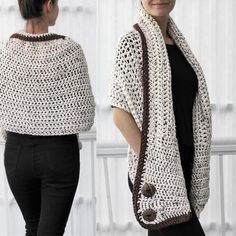 a woman wearing a white crocheted shawl and black pants