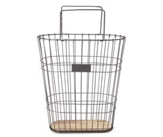 a metal wire basket with a wooden board in the bottom and an iron handle on top