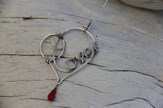 Wire wrap heart necklace pendant love heart by Keepandcherish Metal Jewelry Making, Wire Wrap Jewelry Designs, Chain Heart, Aluminum Jewelry, Laser Cut Jewelry, Jewelry Design Inspiration, Wire Jewelry Designs, Word Love, Diy Wire Jewelry