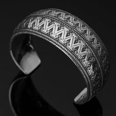 FREE SHIPPING Heavy and very impressive bracelet in fine silver with handstamped details. The original bracelet was a part of a treasure find from the Spillings Hoard that is the world's largest Viking silver treasure. It was found on July 16, 1999, in a field at the Spilling farm on northern Gotland in Sweden. The massive, prominent piece has been wholly handmade according to ancient Viking silversmithing techniques with scrupulous attention to details. The bracelet is first handforged, after w Viking Men, Ancient Vikings, Viking Woman, Viking Age, July 16, Viking Jewelry, Bracelet Silver, Free Jewelry, Fine Silver