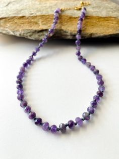 "Amethyst Knotted necklace. -6mm amethyst beads. -Gold plated findings. Necklace length from 14\" to 30\"+ 3 inches chain extender. * Custom orders are welcome.. Every once in awhile, you see things that bring you pure joy. Admire this necklace and smile as others do the same when you wear it.  Note: The beads are all natural and unique. Therefore, they may not have the same pattern or exact look as those seen in the picture.  Thank you!! *Custom orders welcome." Lavender Gemstone Beaded Necklaces As Gift, Lavender Gemstone Beaded Necklaces For Gift, Lavender Gemstone Beads Necklace For Gift, Purple Beaded Necklaces With Faceted Beads As Gift, Purple Faceted Beads Necklace As Gift, Lavender Crystal Necklaces With Faceted Beads For Gifts, Purple Amethyst Faceted Bead Crystal Necklaces, Lavender Faceted Beads Crystal Necklace Gift, Purple Faceted Beads Necklace For Gift