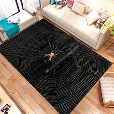 a living room with a spider web rug on the floor