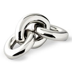 two silver rings on top of each other with one ring in the middle and another knot at the end