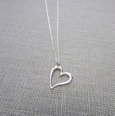 Silver Heart Necklace | Sterling Silver Heart Charm Necklace | .925 Silver Cutout Heart Charm | Hear Silver Dainty Heart Necklace, Silver Double Heart Necklace With Heart Detail, Silver Heart Necklace With Heart Detail, Silver Charm Necklace With Heart Beads And Pendant, Dainty Silver Heart Necklace, Nickel-free Heart Pendant Necklace For Everyday, Nickel Free Everyday Heart Necklace, Simple Silver Heart Necklace For Valentine's Day, Simple Silver Heart Necklace For Anniversary