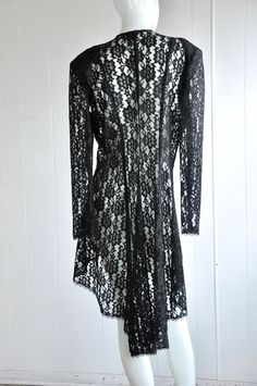 "A gorgeous 2-piece dress and jacket featuring sequins, beads, and lace. The jacket has a hidden eye and hook closure. There are two front panels that end in beads. Has shoulder pads. Brand is Dollar. Vintage size 17. Seems suited for a modern-day large, but please see below for accurate fit. CONDITION: Wonderful. No flaws to note. MEASUREMENTS JACKET Bust: 44\" Waist: 34\" Length: 46\" Shoulder span: 18\" Sleeve: 25\" DRESS Bust: 38\" Waist: 34\" Hips: 40\" Length: approx. 38\" Have a question? Gothic Lace Dress For Party, Fitted Lace Dress With Patchwork For Fall, Fitted Lace Patchwork Dress For Fall, Gothic Fitted Lace Dress For Parties, Gothic Lace Party Dress, Gothic Lace Dress For Evening, Fitted Party Dress With Lace Collar, Party Dress With Lace Collar, Gothic Party Dress With Lace Patchwork