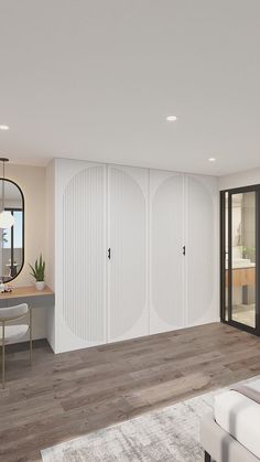 a living room filled with furniture and lots of white closet doors in front of a mirror