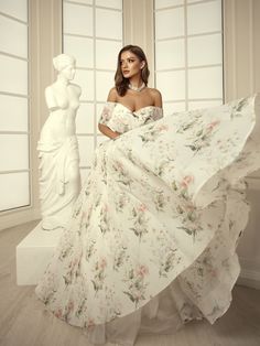 A beautiful women's dress can not only emphasize the individual beauty, but also give confidence, grace, elegance, and a positive mood ✨ 💕 Highlights:   - made of high-quality matte organza with floral print  - available in ivory color  - maxi-length lightweight skirt   - open shoulders    - the bust is emphasized with the help of a cutout 📯 Delivering service Your requests are in safe hands, we provide only the fastest delivery (USPS, DHL).  Fast shipping 5-14 days to any point in the world. Summer Wedding A-line Gown, Elegant A-line Floral Evening Dress, Spring Wedding A-line Chiffon Dress, Off White A-line Wedding Dress, Elegant Flowy A-line Floral Dress, Elegant A-line Evening Dress For Garden Party, White A-line Dress With Flowy Skirt, Elegant Summer Wedding Ball Gown, White A-line Ball Gown For Wedding