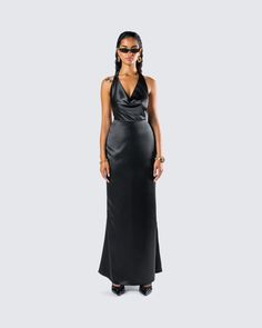 Slip into seduction with this black maxi dress 🖤 Made from luxurious satin charmeuse fabric, this piece is complete with a bias cut and a cowl neck for a look that gives off a chic and mysterious vibe that will have everyone hooked �😌 Holly Black, Black Maxi, Cargo Pant, Cowl Neck, Black Satin, Black Maxi Dress, Dresses Xs, Dress Making, Print Dress