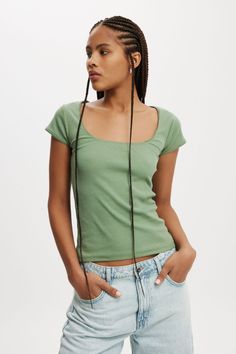 Lou Square Neck Short Sleeve Trendy Fitted T-shirt With Square Neck, Trendy Fitted T-shirt With Ribbed Neckline, Trendy Fitted Tops With Square Neck, Green Stretch Plain Tops, Basic Fitted Top With Square Neck, Trendy Fitted Top With Seamless Collar, Fitted Square Neck T-shirt For Spring, Square Neck Ribbed Stretch Tops, Basic Square Neck Tops For Spring