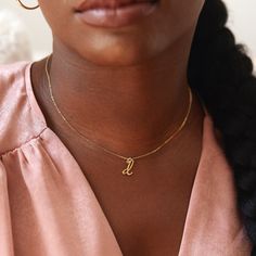 Understated and chic, the Nella Mini Initial Pendant lets you wear your initial or the initial of someone you love with a lowercase letter charm that can be worn on its own or layered with other pieces. Available in sterling silver, 18k gold plated or 18k rose gold plated silver Size: 1/4 to 1/2" (varies by letter) 16" cable chain with 2" extender Spring ring closure Made in the USA This is a lowercase only font, uppercase letters entered will be produced as lowercase This item is FINAL SALE and Tan Monogram Initial Pendant Necklace, Tan Initial Pendant Necklace, Monogram Initial Pendant Name Necklace, Sterling Silver Initial Pendant Necklace With Delicate Chain, Sterling Silver Initial Necklace With Delicate Chain, Initial Pendant Name Necklace, Tan Initial Pendant Charm Necklaces, Rose Gold Initial Pendant Name Necklace, Dainty Initial Pendant Necklace