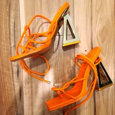 Size 9 Women's Orange Strappy Lace Up Heels With Gold Heel. Modern And Hot! Great Condition, Only Worn Once. Straps Unworn. Modern Orange Sandals For Party, Orange Modern Party Sandals, Modern Orange Party Sandals, Orange Heels With Sculpted Heel For Spring, Orange Sandals With Sculpted Heel For Parties, Orange Party Sandals With Sculpted Heel, Trendy Orange Heels For Party, Trendy Orange Party Heels, Trendy Orange Open Heel Heels