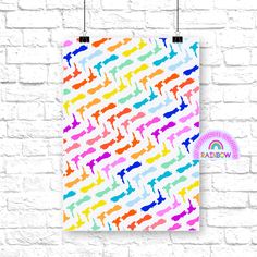 a poster hanging on a brick wall next to a white brick wall with a rainbow pattern