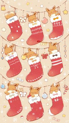 christmas stockings hanging on a line with stars and snowflakes