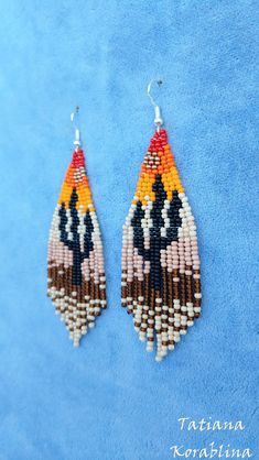 These handmade earrings are made of high-quality Czech beads and strong synthetic thread.In these unique earrings I use my author's scheme . Someone will see on the earrings of sun, sky, cactus, desert, canyon . They are elegant, fashionable, and highly versatile, suitable for everyday wear. Color: orange,red,braun,beige,black, gold (7 colores) Copy without my permission is prohibited I will make for you in the right and favorite color 100% hand made with love! Measurements: Length with hook -9. Beaded Tassel Drop Earrings, Handmade Unique Long Drop Beaded Earrings, Handwoven Dangle Beaded Earrings, Handmade Multicolor Beaded Long Drop Earrings, Handmade Multicolor Long Drop Beaded Earrings, Unique Handwoven Dangle Beaded Earrings, Unique Handwoven Beaded Dangle Earrings, Adjustable Chandelier Earrings With Colorful Beads, Unique Dangle Beaded Earrings With Tiny Beads