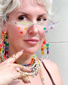 The perfect party glasses for any occasion! Material: 18K Gold Plated Brass; Cubic Zirconia; Transparent Neon Pink, Rust, Yellow, Green, Blue, Purple, & Iridescent Acrylic Handmade in NYC, ready to ship! Not UV protected. Do not wear while driving! We are a small team: processing takes between 1-10 business days, depending on the number of orders. Thank you for your patience! Shipping and Returns policy All sales items are final sale Have questions/need help? We're here for you! help@islynyc.com or reach out in our chat box!#ISLYNYC @ISLYNYC #ISLYicon Summer Party Glass Jewelry, Multicolor Plastic Jewelry For Party, Plastic Beaded Jewelry For Party, White Glass Jewelry For Party, Summer Party Clear Jewelry, Clear Glass Jewelry For Party, Handmade Clear Jewelry For Party, Fun Plastic Jewelry For Party, Fun Plastic Party Jewelry