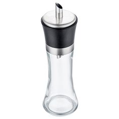 a glass salt and pepper shaker with a black top on a white background photo