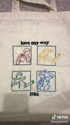 a tote bag with embroidered pictures of people and words that say love my way