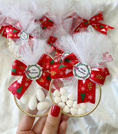 two baskets filled with white chocolates on top of a table