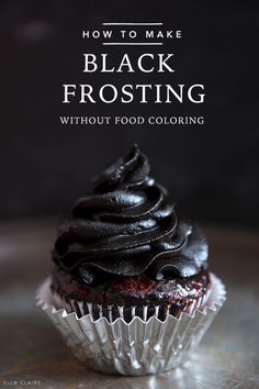 a chocolate cupcake sitting on top of a metal plate with the title how to make black frosting without food coloring