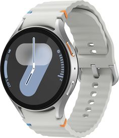 a smart watch with a white band and blue numbers on the face, is shown