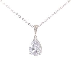 "Our new Avery pendant is made with a gorgeous teardrop cut crystal stone that sparkles like crazy.  - 18\" length (free custom sizing) - Crystal stone measures 10mm x 14mm - Silver, gold, or rose gold - Easy returns SHOP THE COLLECTION: https://www.etsy.com/shop/TigerlillyCouture PACKAGING: Arrives in a custom Tigerlilly box, perfect for gifting and storing the jewelry. Printed receipts are not included in the box. You may print a receipt directly from Etsy for your records. If it is a gift, we will print your custom gift message and include it in the package. To include a gift message, choose the \"This order is a gift\" box on the shopping cart page, and write your message in the box below. SHIPPING TO USA: This piece will ship from our studio within 1 business day of your order. We shi Gold Bracelet Wedding, Crystal Wedding Necklace, April Birthstone Necklace, Gold Leaf Pendant, Gold Bridal Necklace, Crystal Earrings Wedding, Gold Earrings Wedding, Pearl Earrings Wedding, Diamond Birthstone