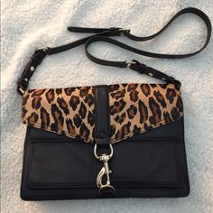 Rebecca Minkoff Hudson Moto Bag. Color: Black. Black Leather With Leopard Print Hair. Size: 12”L X 5”D X 9”H. Strap Drop: 21”. This Is The Large Size, Not The Mini Version. Brand New And Never Worn. Comes With Dust Bag. Push-Lock Flap Opens To A Lined Accordion Interior With 4 Pockets. Optional, Adjustable Crossbody Strap. This Cute Style Is No Longer Made And Hard To Find. No Trades. Black Bags With Palladium Hardware For On-the-go, Black Bags With Palladium Hardware For Daily Use, Brown Shoulder Bag With Gunmetal Hardware For Evening, Black Saddle Shoulder Bag With Palladium Hardware, Brown Bags With Gunmetal Hardware For On-the-go, Black Flap Bag With Palladium Hardware For Everyday, Black Flap Bag With Palladium Hardware For Travel, Leopard Print Hair, Rebecca Minkoff Bag