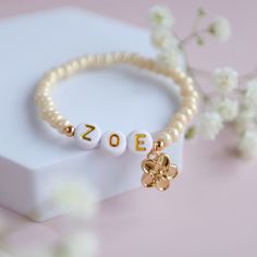 Personalised Flower Girl Bracelet. Flower Charm Bracelet. Gold Plated Flower Charm. - Etsy Flower Charm Bracelet, Charm Bracelet Gold, Flower Girl Bracelets, Girl Bracelet, Bracelet Flower, Brown Box, Flower Plates, Letter Beads, Name Bracelet