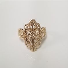 "Thanks for shopping our vintage estate store. We tend to sell well below wholesale and truly hope you enjoy all of our items. Many of the items are one of a kind, so please enjoy scrolling through the pictures and hopefully something will catch your eye. Brown spots are from the reflections or camera. Nice estate 14k yellow gold Victorian style filigree ring, one that I love. Ring size: 6 Setting: 1/2\" 10mm by 3/4\" Band width: 2mm Weight: 2.67 grams Sweet ring. Marked 14k as all our gold is m Formal Gold Flower Ring Stamped 14k, Yellow Gold Filigree Ring For Formal Occasions, Victorian Wedding Jewelry With Hallmark, Victorian Hallmark Jewelry For Wedding, Formal Yellow Gold Filigree Ring With Intricate Design, Elegant 14k Gold Engraved Filigree Ring, Elegant 14k Gold Engraved Ring With Hallmark, 14k Gold Elegant Engraved Ring, Ornate 14k Gold Filigree Wedding Ring