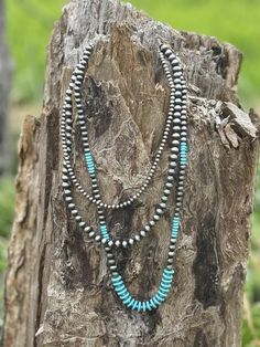 Embrace the timeless beauty of the Southwest with this stunning layered necklace featuring silver pearls and captivating turquoise beads. Each layer cascades gracefully, creating a unique and eye-catching statement piece. (20", 24", 30" long)  Faux silver and turquoise Blue Stacked Round Bead Jewelry, Silver Bohemian Beaded Necklaces For Layering, Navajo Pearls, Layer Necklace, Layered Necklace, Turquoise Beads, Silver Pearls, Western Wear, Layered Necklaces