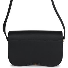 This Della Cavalleria Elan is of Black Epsom leather with gold hardware, features tonal stitching, rectangular shaped bag with curved base, gold half-bit clasp closure, a flat leather buckle shoulder/crossbody strap with one exterior back pocket. The interior is lined in Black swift leather and has one interior slip pocket on back wall.Collection: WOrigin: FranceCondition: New and never worn (plastic on hardware)Accompanied by: Hermes box, Hermes dustbag, felt, and carebookMeasurements: 9" width