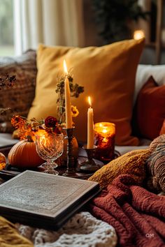 Cozy fall home decor with candles, pumpkins, and warm blankets on a tray. Perfect for a fall living room decor vibe that brings comfort and warmth. Fall Decor Party, Fall Party Decor, Fall Dining Room Table, Elegant Fall Decor, Simple Fall Decor, Fall Dining Room, Rustic Tablecloths, Easy Fall Decor, Cozy Fall Decor