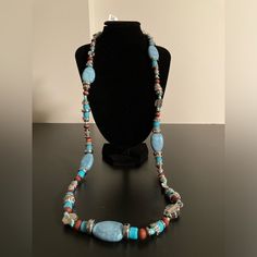 Macy’s Beaded Necklace With Turquoise, Red, And Silver Colored Beads I Have Lots Of Jewelry Listed, So Feel Free To Create A Bundle And Pay Only A $7.67 Flat Rate (For Up To 5 Lbs), Plus Take Advantage Of Bundle Pricing! Reasonable Offers Are Also Welcome. If You Like (Click Heart Sign On) Multiple Items, I Will Make Them Into A Bundle For You And Offer A Discount. New To Poshmark? Use This Link (Https://Posh.Mk/Vrvp72vgzab) Or The Referral Code (Me_and_mommy) To Save $10 On Your First Purchase. Bohemian Large Blue Beads, Bohemian Blue Beaded Necklaces With Natural Stones, Blue Bohemian Beaded Necklace With Natural Stones, Long Blue Beaded Turquoise Necklace, Blue Hand-strung Bohemian Beaded Necklaces, Bohemian Blue Hand-strung Beaded Necklaces, Blue Polished Bohemian Beads, Bohemian Blue Polished Beads, Bohemian Blue Turquoise Necklace With Polished Beads