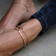 One of our favorite sexy, barefoot living accessories. 14K Gold Filled Chain. Length: 10" (adjustable) Reiki infused by Mara. Elegant Adjustable Tarnish-resistant Anklets, Yellow Gold Delicate Chain Anklet, Delicate Chain Yellow Gold Anklet, Dainty Gold Chain Anklet, Minimalist Chain Anklets, Elegant Yellow Gold Chain Anklets, Elegant Adjustable Chain Anklets, Minimalist Gold Chain Anklets, Minimalist Gold Anklet With Adjustable Chain