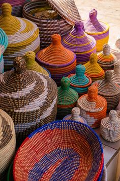 many baskets are stacked on top of each other